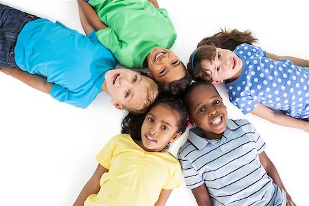 Cute children lying in a circle on white background Stock Photo - Budget Royalty-Free & Subscription, Code: 400-07689210