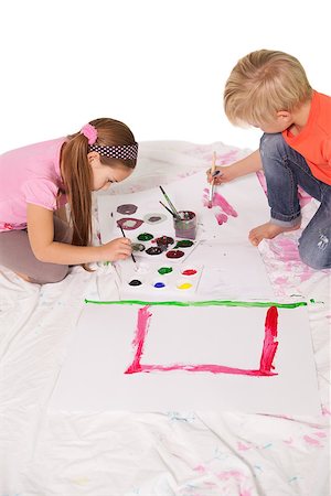 painting of boy kneeling - Happy little children painting on the floor on white background Stock Photo - Budget Royalty-Free & Subscription, Code: 400-07689293