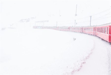 simsearch:400-07680071,k - The famous Bernina red train, Unesco monument, in the middle of a winter storm Photographie de stock - Aubaine LD & Abonnement, Code: 400-07680071