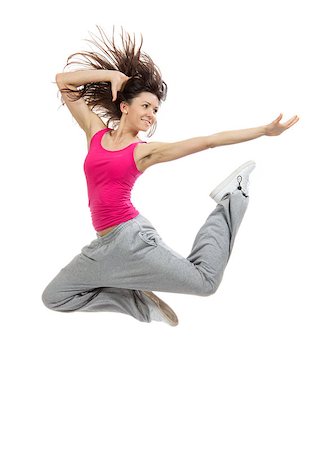 New pretty modern slim hip-hop style dancer teenage girl jumping dancing isolated on a white studio background Stock Photo - Budget Royalty-Free & Subscription, Code: 400-07680174