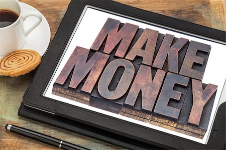 simsearch:400-07295043,k - make money online concept - words in vintage letterpress wood type on a digital tablet with a cup of coffee Foto de stock - Super Valor sin royalties y Suscripción, Código: 400-07680604