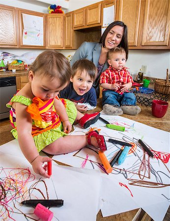 photo of mother feeding baby high chair - Family spending time together in kitchen Stock Photo - Budget Royalty-Free & Subscription, Code: 400-07680757