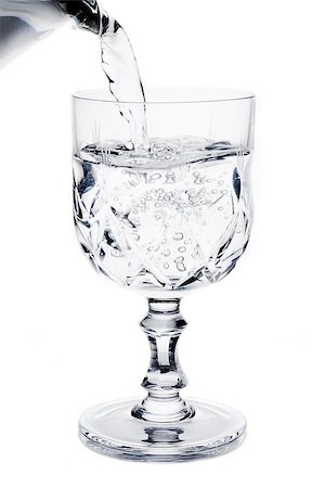 simsearch:400-06918144,k - filling a glass with pure water on white background Stock Photo - Budget Royalty-Free & Subscription, Code: 400-07681024