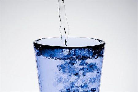 simsearch:400-06918144,k - detail of filling a blue glass with pure water and bubbles Stock Photo - Budget Royalty-Free & Subscription, Code: 400-07681029