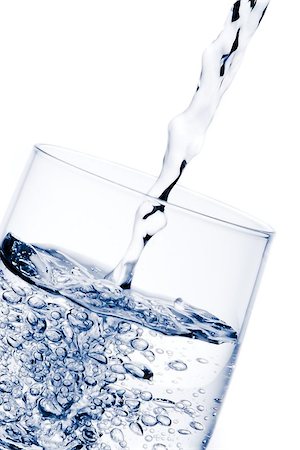 simsearch:400-06918144,k - pouring water in the glass on white background Stock Photo - Budget Royalty-Free & Subscription, Code: 400-07681020
