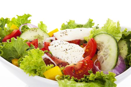 Delicious fresh colorful salad isolated on white background. Healthy light and diet summer eating. Stock Photo - Budget Royalty-Free & Subscription, Code: 400-07681060