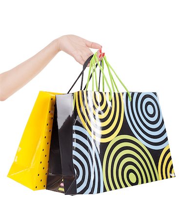 simsearch:400-05247916,k - Female hand holding colorful shopping bags Foto de stock - Super Valor sin royalties y Suscripción, Código: 400-07681322