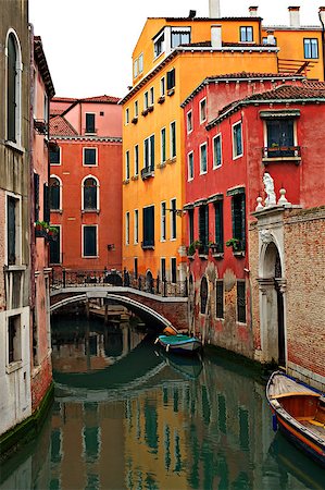 simsearch:400-05384275,k - Looking towards a bridge over a canal leading to colorful houses in Venice, Italy. Stock Photo - Budget Royalty-Free & Subscription, Code: 400-07681420