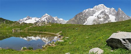 rcaucino (artist) - The south face of Mont Blanc (italian side), from the Vesses lake in Val Veny valley along the famous Tour du Mont Blanc trail. Courmayer, Valle d'Aosta, Italy. Photographie de stock - Aubaine LD & Abonnement, Code: 400-07681452