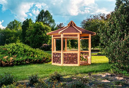 summerhouse - Outdoor wooden gazebo over summer landscape background Photographie de stock - Aubaine LD & Abonnement, Code: 400-07681727