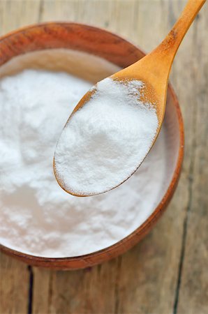 Close-up of Spoon of baking soda over bowl of baking soda Stock Photo - Budget Royalty-Free & Subscription, Code: 400-07682460