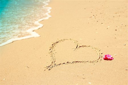 a heart in the sand on the beach Stock Photo - Budget Royalty-Free & Subscription, Code: 400-07682474