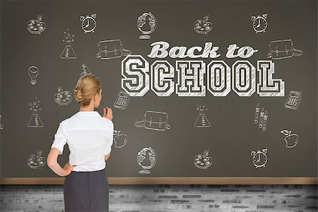 doodle art about school - Thinking businesswoman against blackboard on wall Stock Photo - Budget Royalty-Free & Subscription, Code: 400-07682873