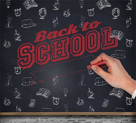 simsearch:400-07683612,k - Hand writing with a chalk against blackboard on wall Stock Photo - Budget Royalty-Free & Subscription, Code: 400-07682887