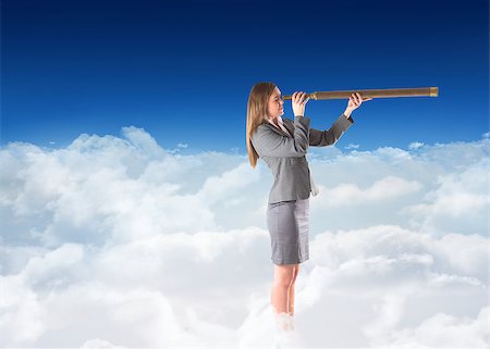 Businesswoman looking through a telescope against blue sky over clouds Stock Photo - Budget Royalty-Free & Subscription, Code: 400-07683044