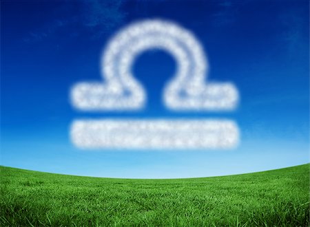 Cloud in shape of libra star sign against green field under blue sky Stock Photo - Budget Royalty-Free & Subscription, Code: 400-07683108