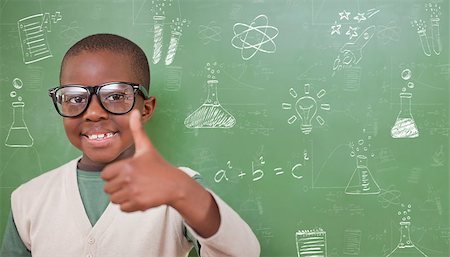 simsearch:400-07684082,k - Cute pupil showing thumbs up against school doodles Stock Photo - Budget Royalty-Free & Subscription, Code: 400-07683136