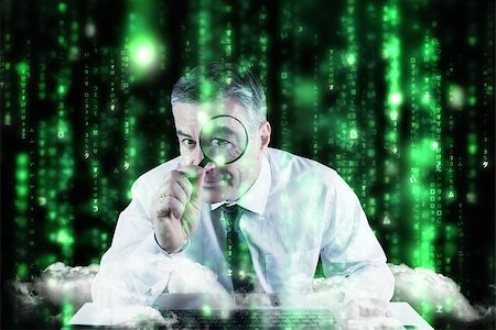 Mature businessman examining with magnifying glass against lines of green blurred letters falling Stock Photo - Budget Royalty-Free & Subscription, Code: 400-07683454