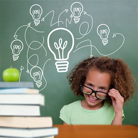 simsearch:400-07684098,k - Cute pupil tilting glasses against green apple on pile of books Stock Photo - Budget Royalty-Free & Subscription, Code: 400-07683540