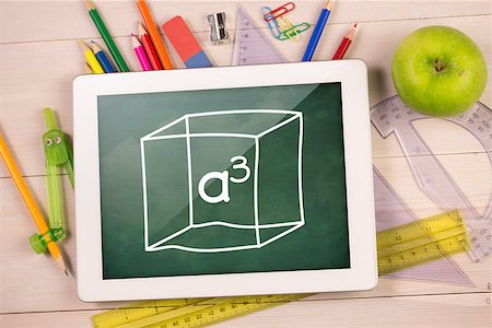 simsearch:400-07682840,k - Composite image of digital tablet on students desk a cubed Fotografie stock - Microstock e Abbonamento, Codice: 400-07683781