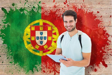 simsearch:400-07683875,k - Student using tablet pc against portugal flag in grunge effect Foto de stock - Super Valor sin royalties y Suscripción, Código: 400-07683855