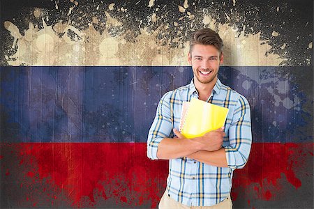 simsearch:400-07683875,k - Young student smiling  against russia flag in grunge effect Foto de stock - Super Valor sin royalties y Suscripción, Código: 400-07683851