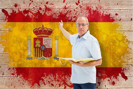 simsearch:400-07683875,k - Teacher holding book and pointing against spain flag in grunge effect Foto de stock - Super Valor sin royalties y Suscripción, Código: 400-07683852