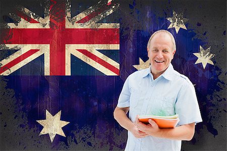 simsearch:400-07683875,k - Mature student holding notebooks against australia flag in grunge effect Foto de stock - Super Valor sin royalties y Suscripción, Código: 400-07683853