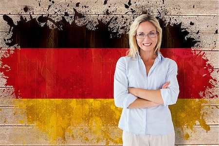 simsearch:400-07683875,k - Mature student smiling against germany flag in grunge effect Foto de stock - Super Valor sin royalties y Suscripción, Código: 400-07683866