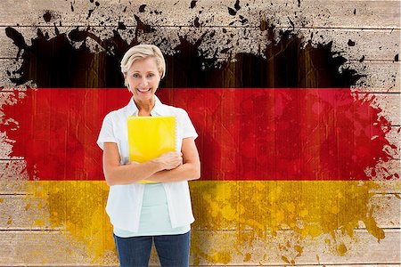 simsearch:400-07683875,k - Mature student smiling against germany flag in grunge effect Foto de stock - Super Valor sin royalties y Suscripción, Código: 400-07683877