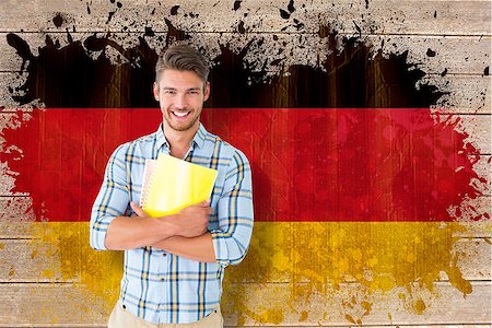 simsearch:400-07683875,k - Young student smiling  against germany flag in grunge effect Foto de stock - Super Valor sin royalties y Suscripción, Código: 400-07683880
