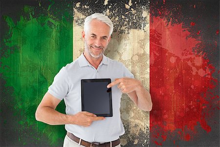 simsearch:400-07683875,k - Mature student showing tablet pc against italy flag in grunge effect Foto de stock - Super Valor sin royalties y Suscripción, Código: 400-07683883