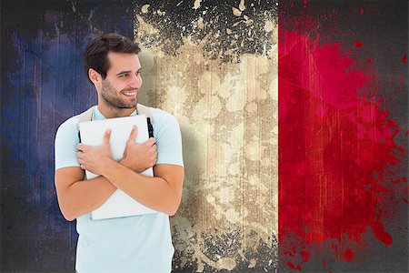 simsearch:400-07683875,k - Student holding laptop against france flag in grunge effect Foto de stock - Super Valor sin royalties y Suscripción, Código: 400-07683894