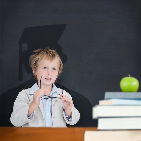 Composite image of cute pupil with graduate shadow in classroom Stock Photo - Budget Royalty-Free & Subscription, Code: 400-07683948