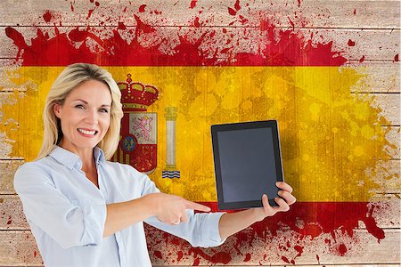 simsearch:400-07683875,k - Mature student pointing to tablet against spain flag in grunge effect Foto de stock - Super Valor sin royalties y Suscripción, Código: 400-07683941