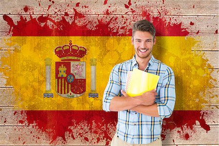 simsearch:400-07683875,k - Young student smiling against spain flag in grunge effect Foto de stock - Super Valor sin royalties y Suscripción, Código: 400-07683942