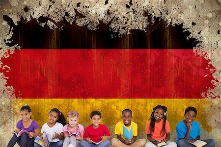 simsearch:400-06876753,k - Elementary pupils reading books against germany flag in grunge effect Photographie de stock - Aubaine LD & Abonnement, Code: 400-07683982