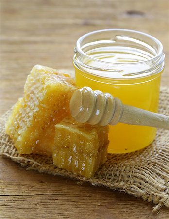 simsearch:400-06640106,k - natural organic honey in the comb on a wooden background Stock Photo - Budget Royalty-Free & Subscription, Code: 400-07714049