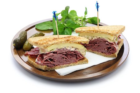 reuben sandwich with pastrami and swiss cheese isolated on white background Stock Photo - Budget Royalty-Free & Subscription, Code: 400-07714518