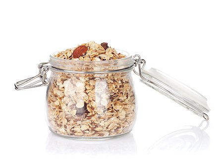 simsearch:400-08113690,k - Glass jar with muesli. Isolated on white background Stock Photo - Budget Royalty-Free & Subscription, Code: 400-07714944