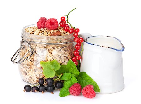 porridge and berries - Healty breakfast with muesli, berries and milk. Isolated on white background Stock Photo - Budget Royalty-Free & Subscription, Code: 400-07714965