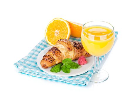 Orange juice and fresh croissant. Isolated on white background Stock Photo - Budget Royalty-Free & Subscription, Code: 400-07714989