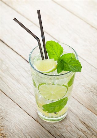 simsearch:400-07715048,k - Fresh mojito cocktail on wooden table Stock Photo - Budget Royalty-Free & Subscription, Code: 400-07715047