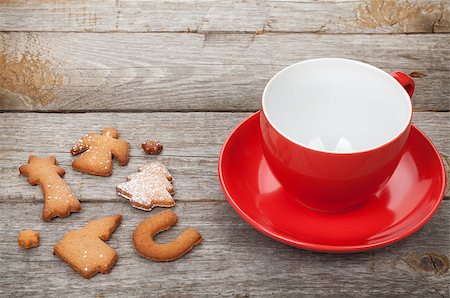 Coffee cup and gingerbread cookies on wooden table Stock Photo - Budget Royalty-Free & Subscription, Code: 400-07715062