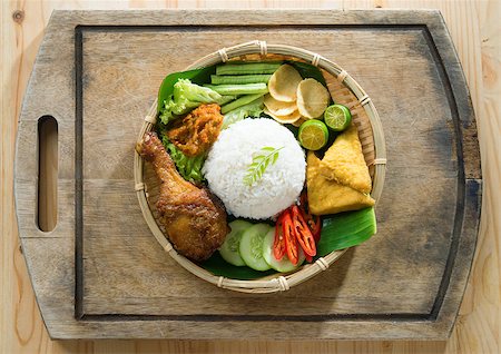 fried chicken with banana - Delicious nasi ayam penyet with sambal belacan. Fried chicken rice with overhead view. Famous traditional Indonesian food. Stock Photo - Budget Royalty-Free & Subscription, Code: 400-07715205