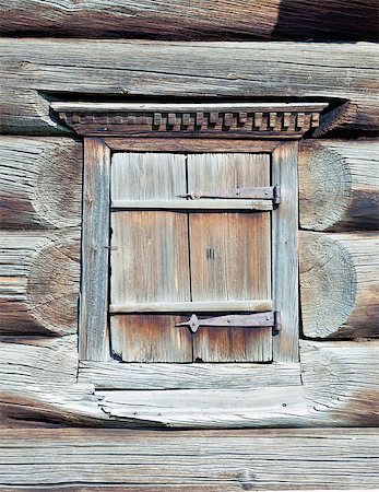 simsearch:400-07576056,k - A small closed window in the wall of an old wooden house Foto de stock - Super Valor sin royalties y Suscripción, Código: 400-07715489