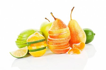 simsearch:400-06953045,k - Colorful summer background. Apple, pear, lime and tangerine pieces, slices and whole fruit isolated. Stockbilder - Microstock & Abonnement, Bildnummer: 400-07715775