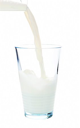 simsearch:614-06719446,k - Pouring milk into a glass isolated on white background with clipping path. Foto de stock - Super Valor sin royalties y Suscripción, Código: 400-07715771
