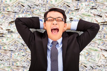 pictures of man lying on money - happy young business man lying on the us dollar Stock Photo - Budget Royalty-Free & Subscription, Code: 400-07715972