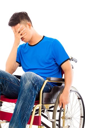 simsearch:400-07987656,k - depressed and handicapped man sitting on a wheelchair Stock Photo - Budget Royalty-Free & Subscription, Code: 400-07715987